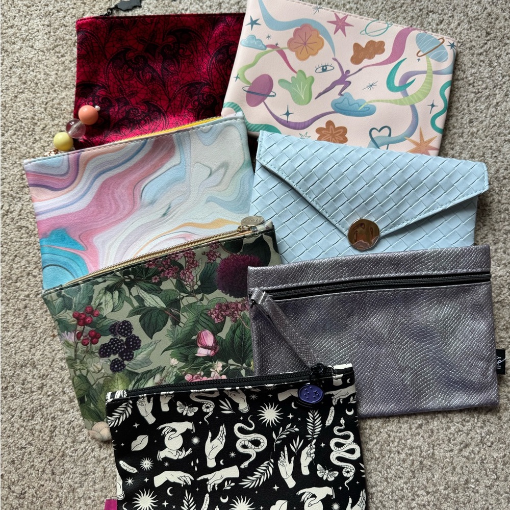 Set of 7 unused IPSY bags!